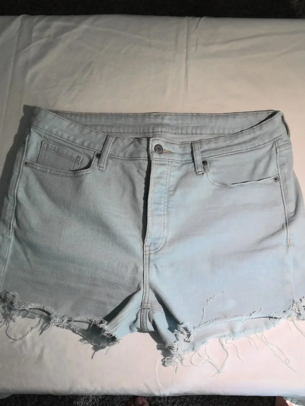 High-Rise Distressed Light Wash Cut-off Jean Shorts